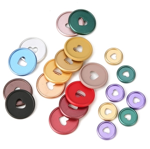 Detail of 35mm matte binding discs with heart cutout for notebooks in various colors