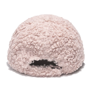 Detail of soft pink faux shearling texture on the back of this warm baseball cap