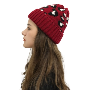 Winter knitted leopard print beanie in burgundy red with stylish cuffed edge for women