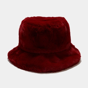Detailed close-up of dark red faux rabbit fur bucket hat showing soft plush texture