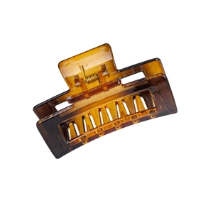 Retro amber leopard rectangular hair claw clip with geometric cutout on white backdrop