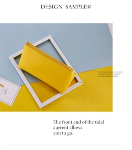 Vista detallada del neceser de maquillaje amarillo de polipiel con textura de grano