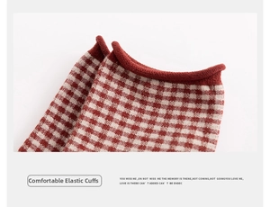 Close-up of comfortable elastic rolled edge on red and white gingham knit cotton socks