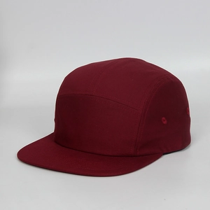 Detail view of burgundy 5-panel cotton camper hat showing metal eyelets and stitching