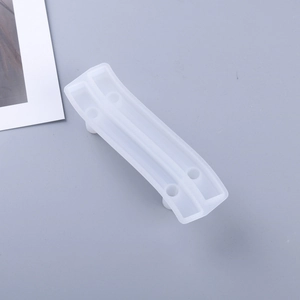Detailed view of translucent silicone handle mold with four positioning holes for DIY resin tray