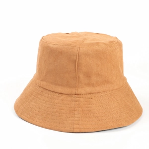 Close-up of brown faux suede bucket hat showing wide brim and parallel stitching details