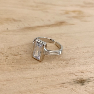 Macro shot of 925 sterling silver ring featuring a rectangular zircon and S925 hallmark