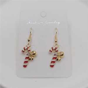 Detailed view of candy cane earrings with red white stripes and golden bows