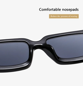 Detail of square sunglasses showing integrated nose pads for comfortable pressure-free fit