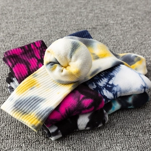 Colorful tie-dye cotton crew socks for men and women with soft interior terry lining