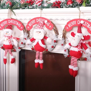 Christmas wreath with plush Santa Snowman and Reindeer characters on a rattan ring
