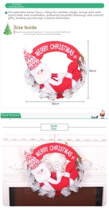 Detailed view of a 30cm rattan Christmas wreath with Santa doll and red berries
