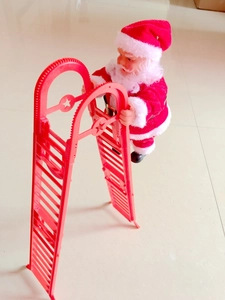 Close-up of Santa Claus climbing a red ladder decoration for Christmas festive home decor