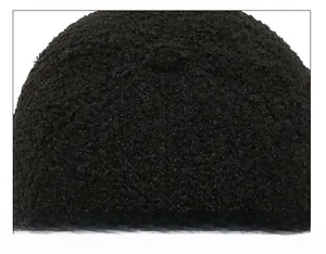 Close-up of precise stitching on the crown of a black faux shearling baseball cap