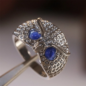 Creative silver owl ring with sparkling white zircons and blue cat eye stone eyes