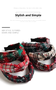 Detail of knitted plaid Christmas headbands with vintage cross-knot design for winter