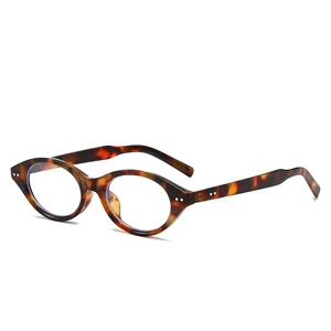 Retro tortoiseshell oval glasses frame with vintage leopard pattern and metal rivet details