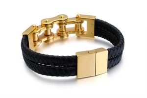 Detail of men's double-row braided black leather bracelet with golden bike chain link