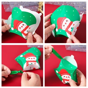 Step-by-step assembly of green star-shaped Christmas gift box with snowman pattern