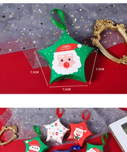 Detail of star-shaped Christmas gift boxes measuring 7.5cm with festive prints and ribbons