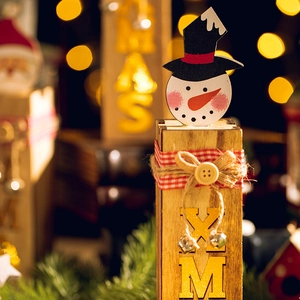 Wooden snowman Christmas table ornament with LED light, bow tie and bell details