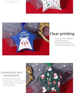 Detail of star-shaped Christmas gift boxes with Merry Christmas print and waterproof coating