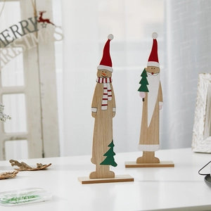 Handcrafted wooden Christmas tree ornaments featuring Santa Claus and Snowman figurines