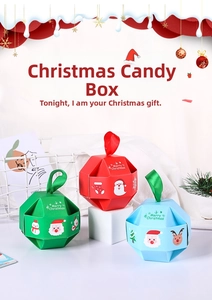 Detailed view of Christmas gift boxes with festive illustrations and ribbon handles
