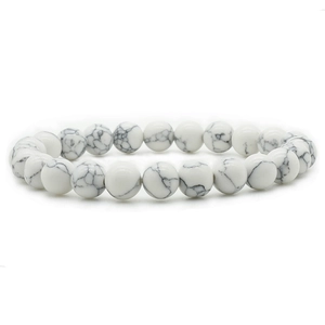 Bracciale minimalista con perline di howlite bianca con trama marmorea ed elastico