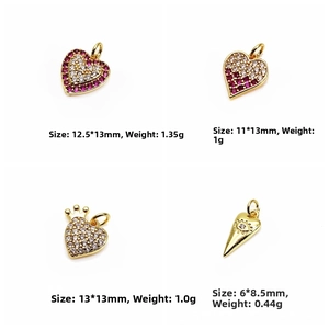 Detail view of heart-shaped charms with micro-paved zircons and gold plating accessories