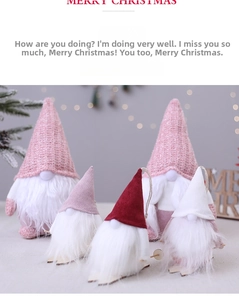 Close-up of festive Christmas gnomes with knit hats and plush beards in holiday decor