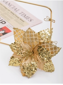 Detail of 17cm gold poinsettia flower with sequins for Christmas decoration