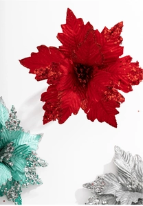 Three glittering artificial poinsettia flowers in red, silver, and teal for Christmas decor