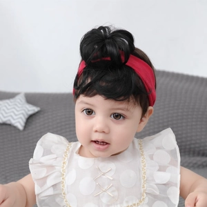 Cute infant headband with red fabric and black synthetic curly buns for baby girls