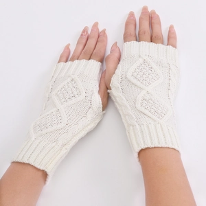 Detailed view of diamond knit pattern on cream-white fingerless winter warm wool gloves