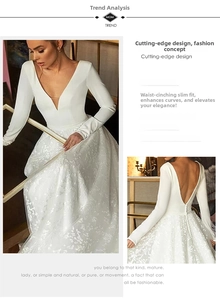 Détail d'une robe de mariée blanche à manches longues avec col en V et dos nu élégant