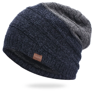 Navy and grey striped chenille knit beanie with warm fleece lining and leather patch