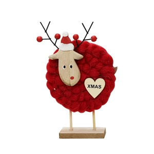 Handmade wool felt Christmas reindeer ornament with wooden base and XMAS heart tag