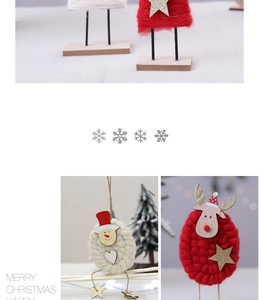 Close-up of handmade wool and wooden snowman and reindeer Christmas shelf ornaments