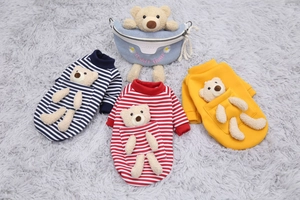 Detail view of colorful striped pet hoodies with matching plush backpacks for dogs and cats