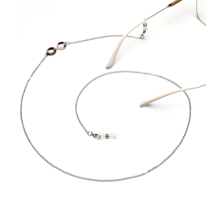 Detail of silver glasses chain with tortoiseshell acetate rings and silicone loops