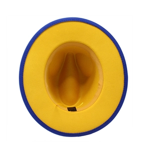 Internal view showing the yellow sweatband and navy brim of this two-tone fedora hat