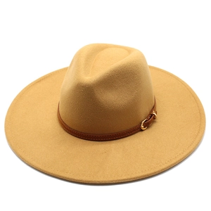 Detail of camel wool fedora hat featuring a brown leather belt with a golden buckle