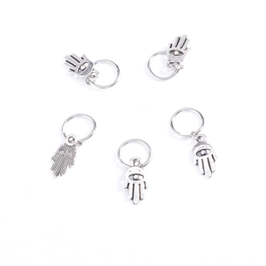 Five silver metal Hamsa hand charms with evil eye detail for DIY hair braid accessories