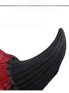 Detailed macro view of bionic spiral texture on red and black cosplay demon horns
