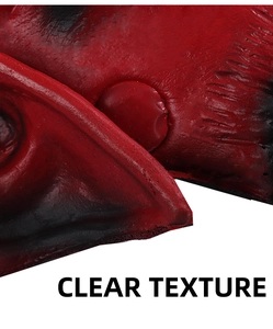 Detailed macro view showing the realistic skin texture of the red blood demon mask