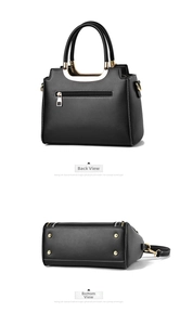 Detailed back view of black leather handbag with rear zipper and gold studs on bottom