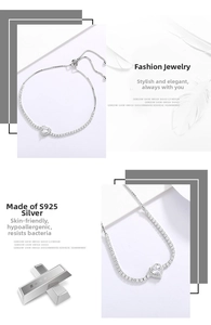 Detalle de pulsera tenis corazón de plata S925 con cierre deslizante ajustable
