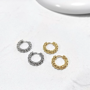 Vintage twisted hoop earrings in gold and silver finish with minimalist design