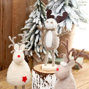 Handmade wool felt Christmas reindeer figurines set for Nordic holiday tabletop decoration